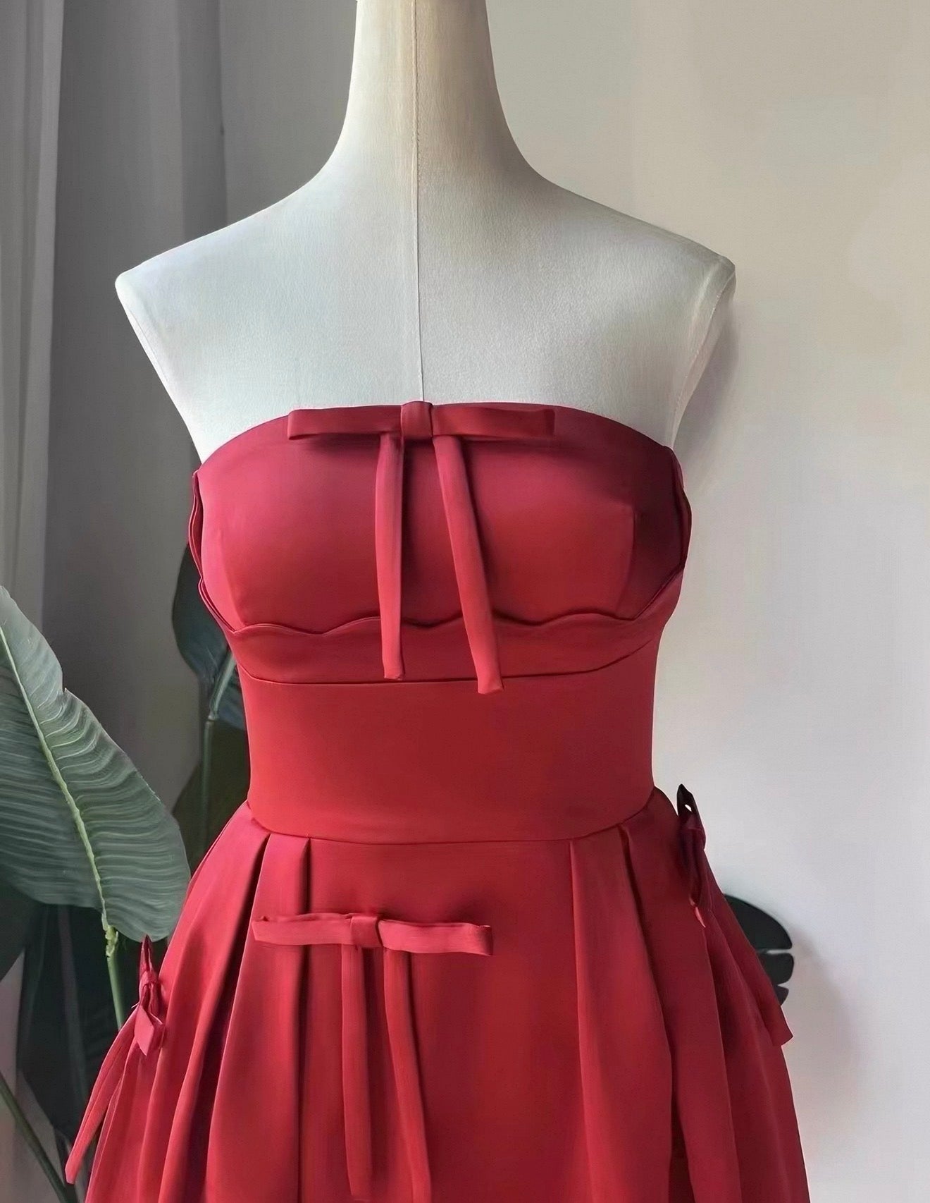 Red satin bow dress